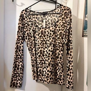 Victoria’s Secret- size L- leopard mesh stretch l/s top. NWT.